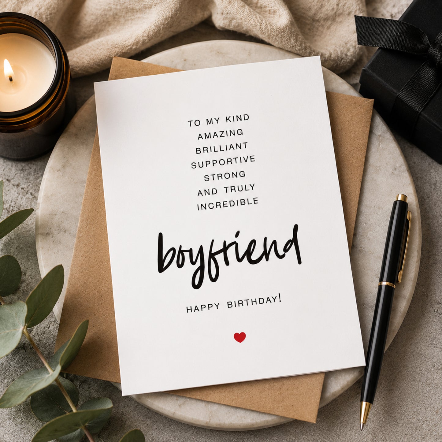 Celebrate your boyfriend with a romantic birthday card featuring elegant typography, a sweet red heart, and space for your personal message.