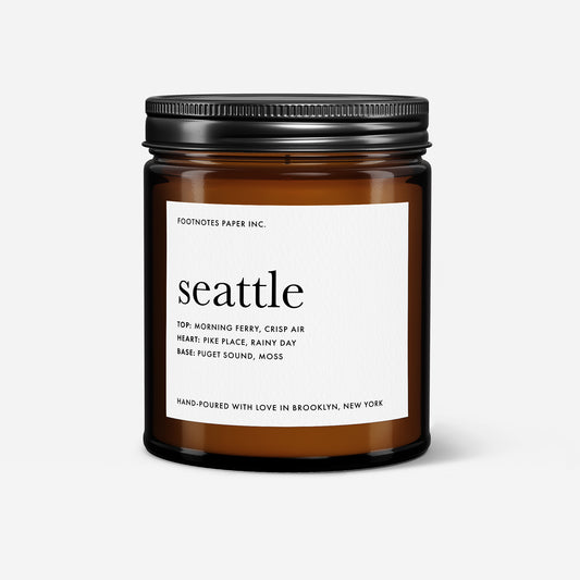 Seattle Candle in an amber jar, Fresh Aquatic Green scented candle inspired by crisp air, rainy days, and mossy forest notes
