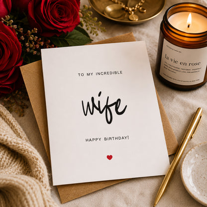 To My Wife birthday card with romantic black typography and a small red heart on a white A2 card with kraft envelope.