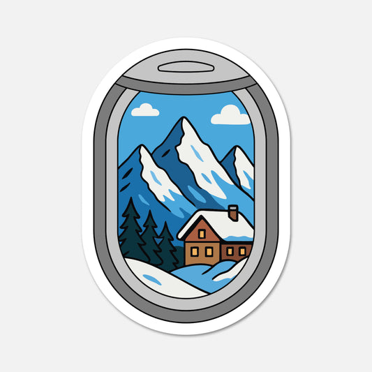 Sticker with a snowy mountain scene and cabin viewed through an airplane window on a white background.