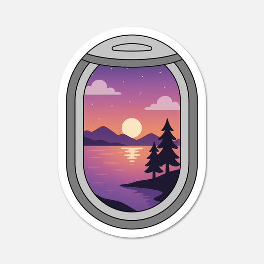 Sticker with a scenic view of a sunset over water and mountains, framed like an airplane window.