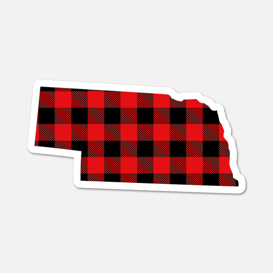 Red and black checkered pattern on a white outline of Nebraska