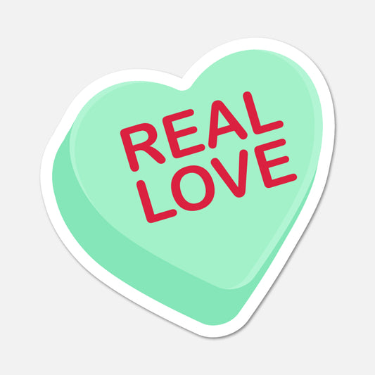 Heart-shaped sticker with 'REAL LOVE' text on a light gray background