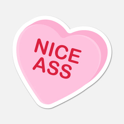 Heart-shaped pink sticker with red text on a light gray background