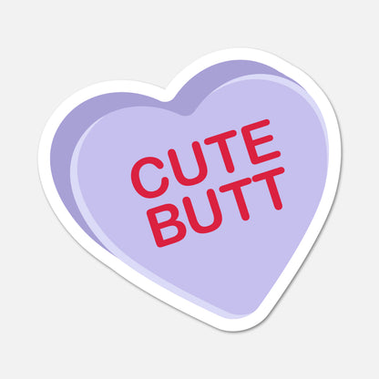 Heart-shaped sticker with 'CUTE BUTT' text on a light purple background