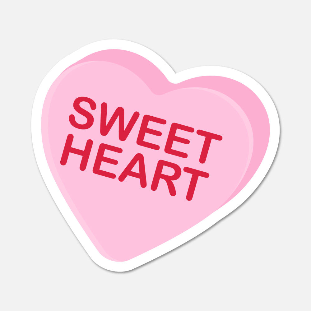 Heart-shaped pink candy with 'SWEET HEART' text on a light gray background