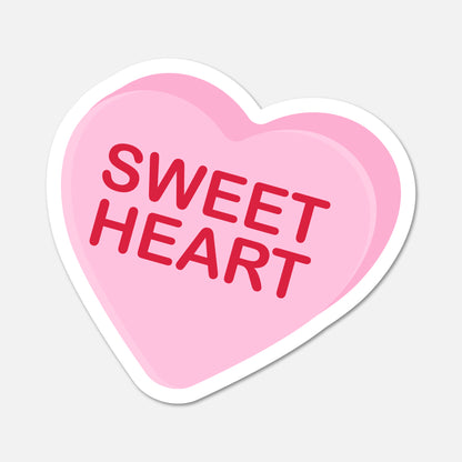 Heart-shaped pink candy with 'SWEET HEART' text on a light gray background