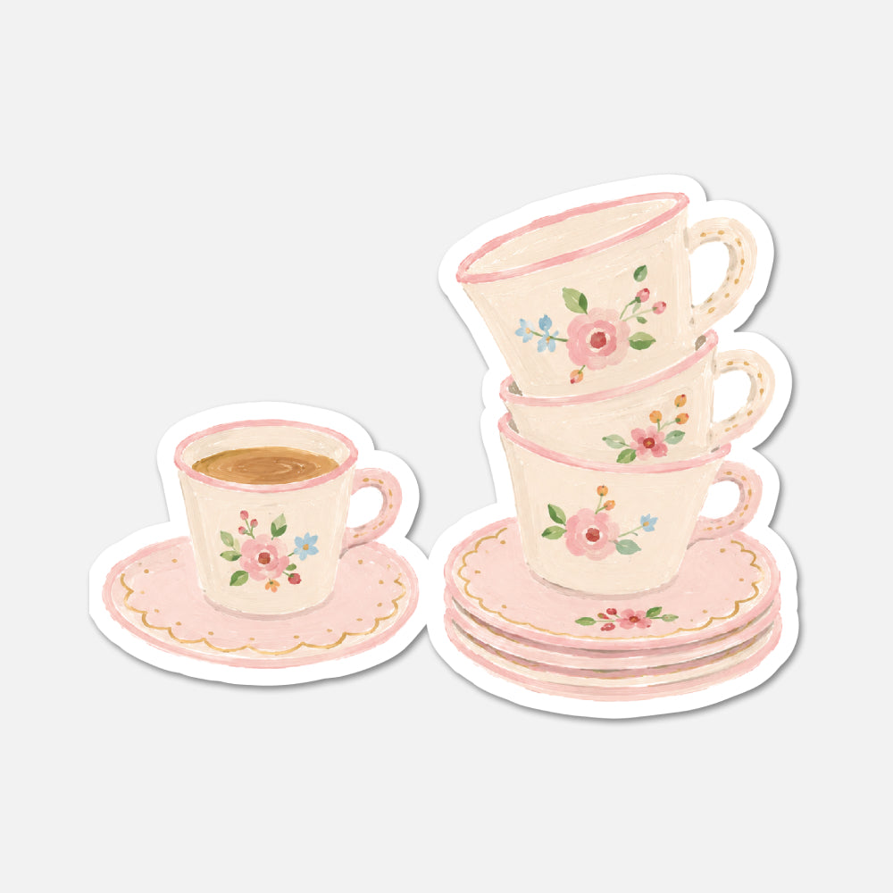 hand drawn stack of floral teacups sticker on white background