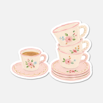 hand drawn stack of floral teacups sticker on white background