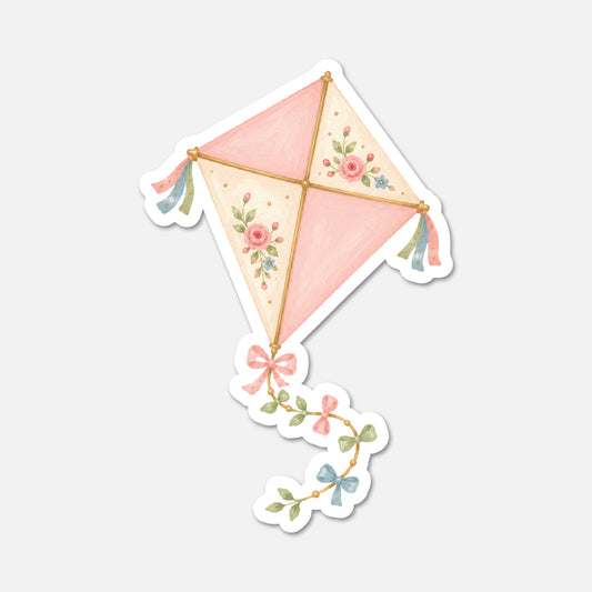 Decorative kite with floral designs on a white background