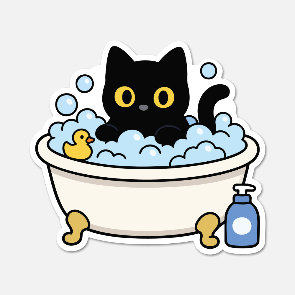 A cartoon-style die-cut sticker showing a black cat sitting in a white bathtub filled with blue bubbles, with a small yellow rubber duck and a blue soap dispenser nearby, on a light gray background.