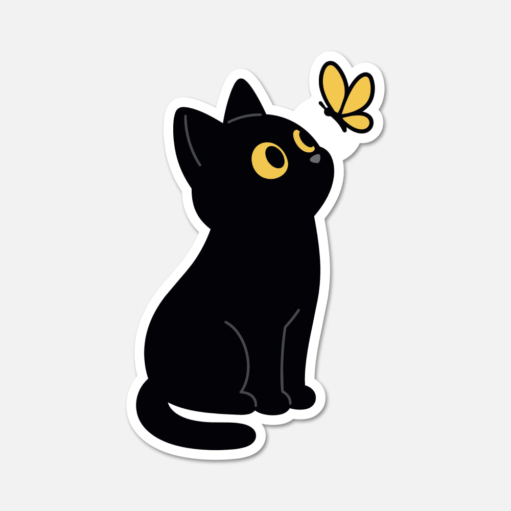 A die-cut sticker featuring a cartoon black cat with yellow eyes looking up at a small yellow butterfly, shown on a light gray background.