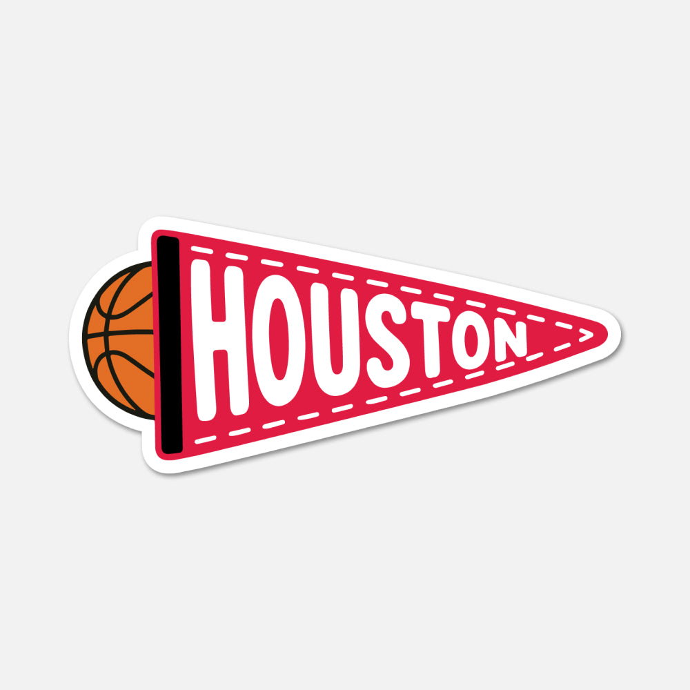 A die-cut sticker shaped like a red sports pennant with the word 'HOUSTON' in large white letters, a basketball peeking out from behind on the left, and a white border, shown on a light gray background.