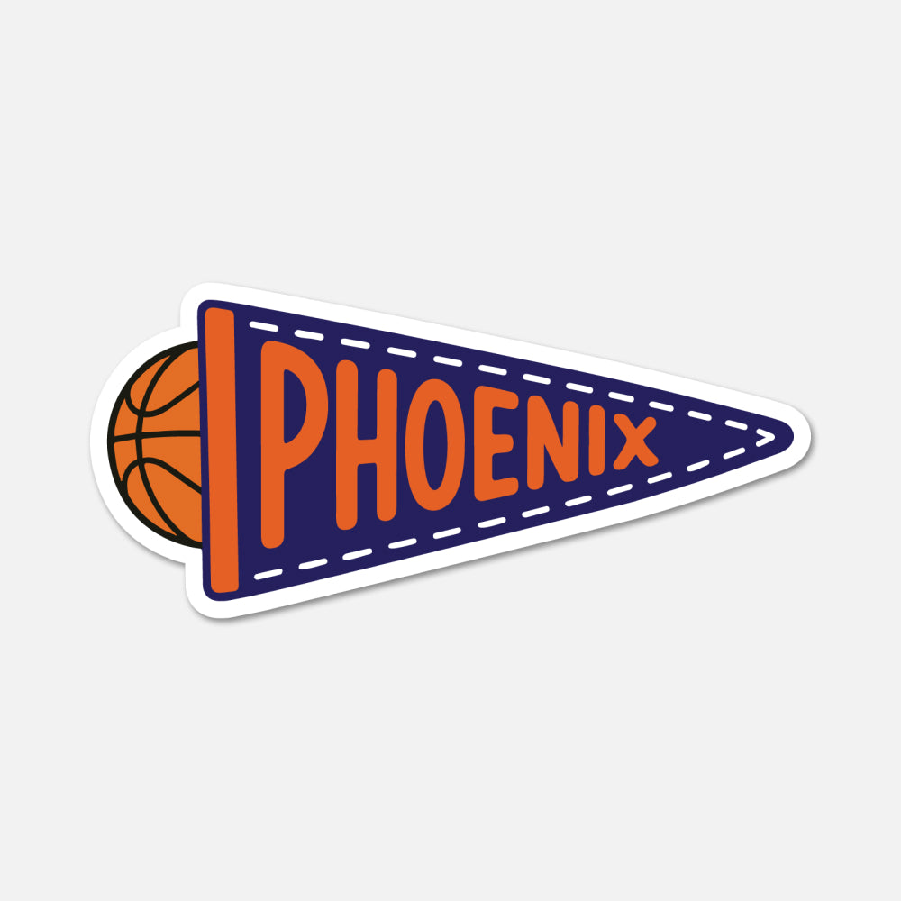 A die-cut sticker featuring a navy blue pennant with the word 'PHOENIX' in orange, alongside an orange basketball graphic on the left, shown on a light gray background.
