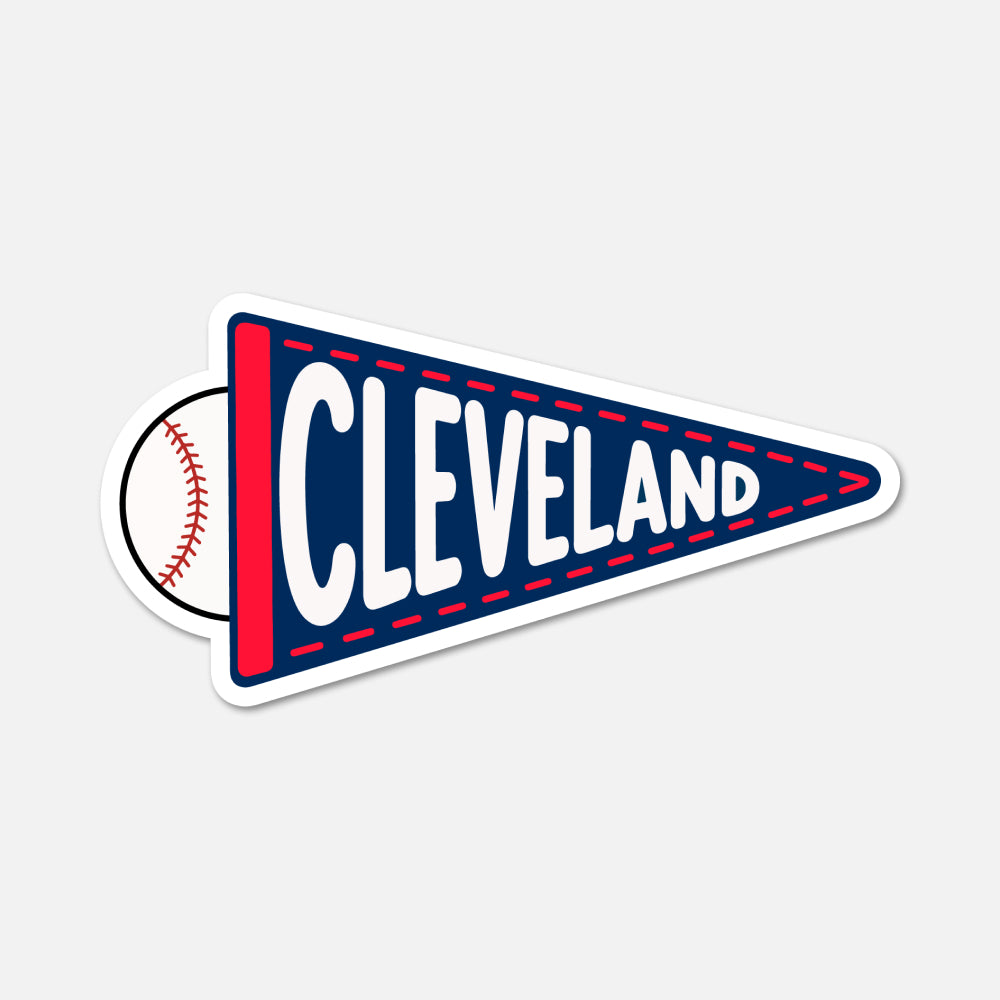 A die-cut sticker shaped like a sports pennant, featuring the word 'CLEVELAND' in large white letters on a navy blue background with red trim, plus a baseball graphic on the left side, shown on a light gray background.