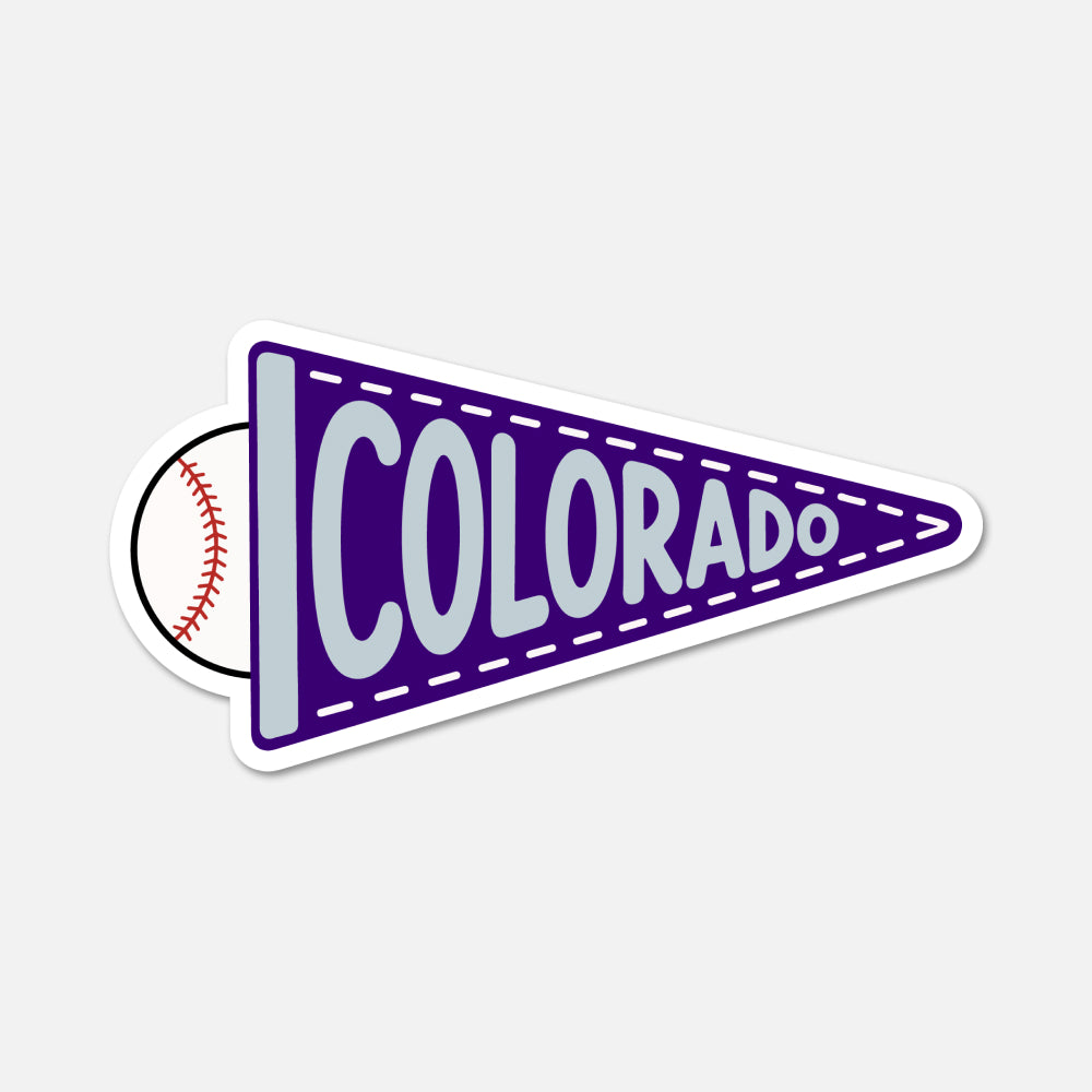 A die-cut sticker shaped like a purple pennant with the word "COLORADO" in large white letters, plus a baseball graphic peeking out from behind on the left, shown on a light gray background.