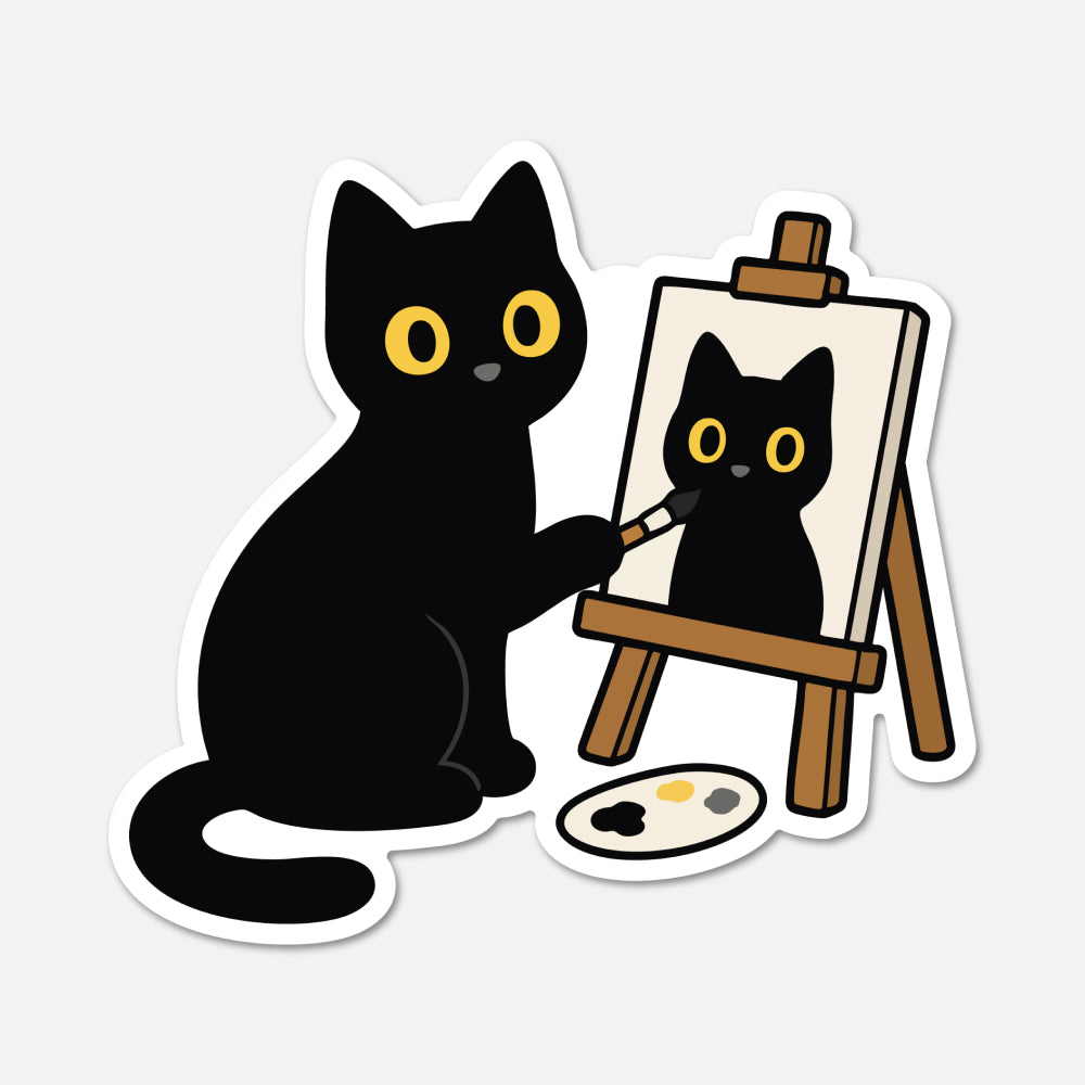 A die-cut sticker featuring a cartoon black cat painting a black cat on an easel, with a paint palette below, shown on a light gray background.