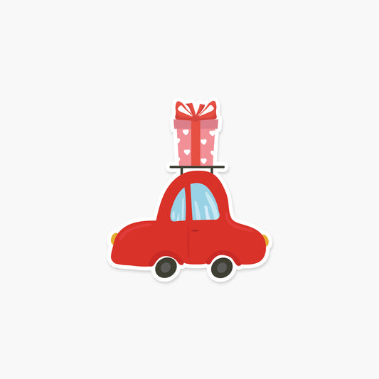 Cute red car with a gift on top Valentine's Day Sticker | Footnotes Paper